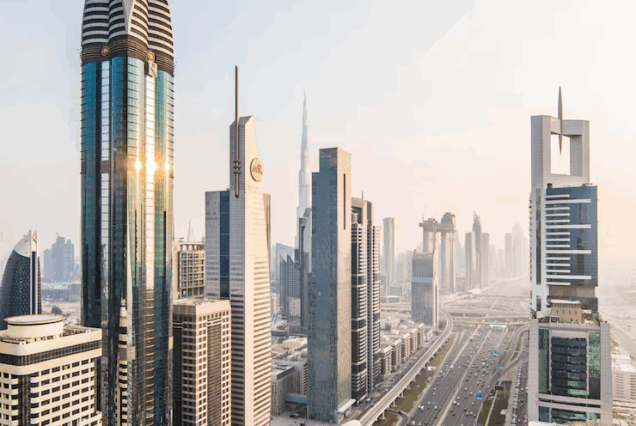 dubai-skyline-sunset-time-united-arab-emirates_231208-7631-636×426